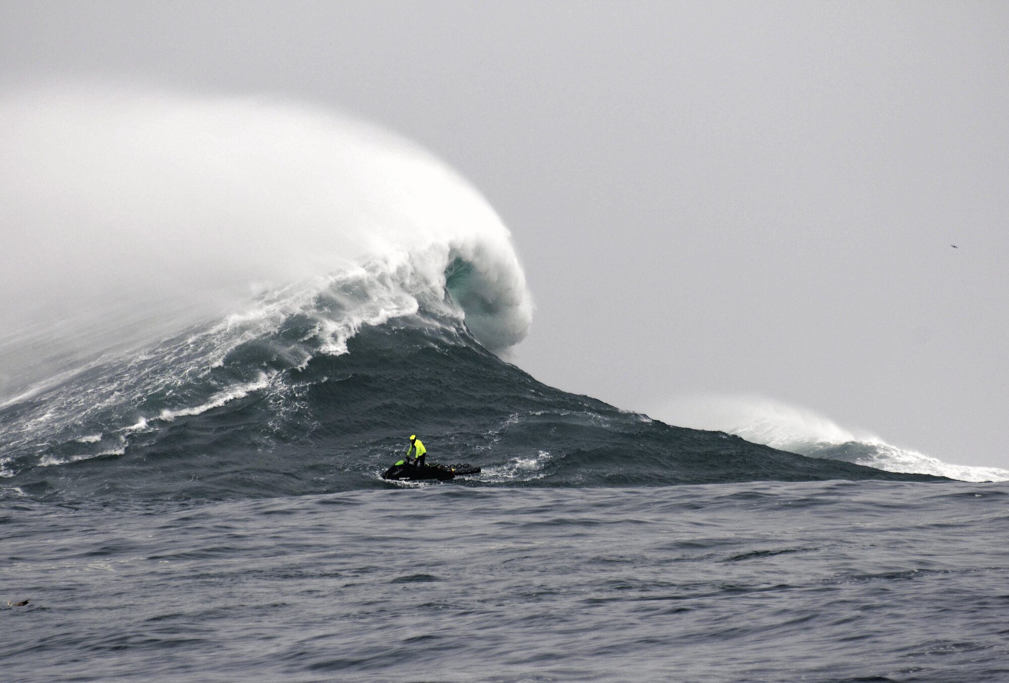 A giant wave breaking over the Nazaré North Canyon